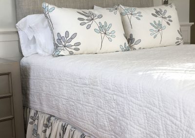 upholstered headboard, bedroom decor, nantucket, summer decorating, vacation home, bedroom decor, queen size bed, white coverlet, floral bedding, upholstery